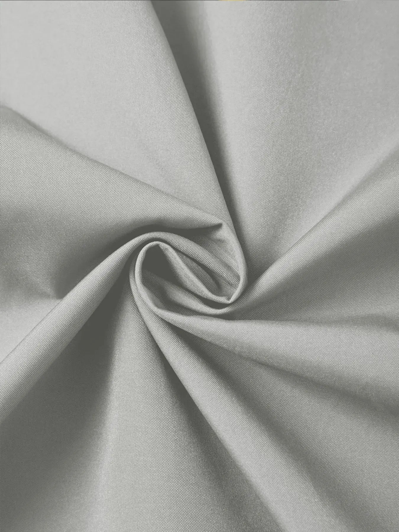 Back view of the Wind Whisperer jacket, highlighting its sleek design and high-quality polyester material.