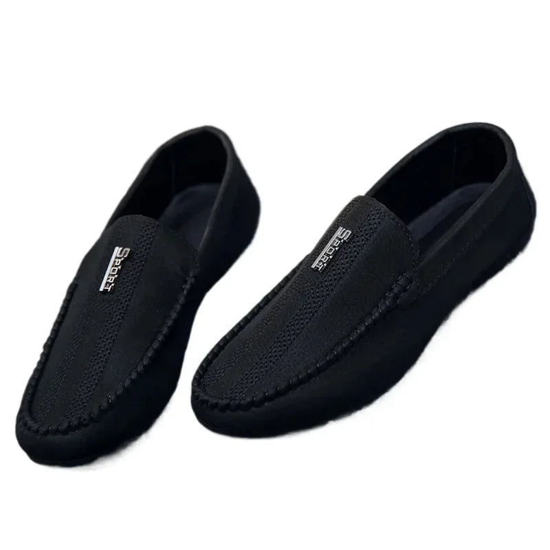 Side view of stylish black loafers showcasing slip-on convenience and minimalistic aesthetic.