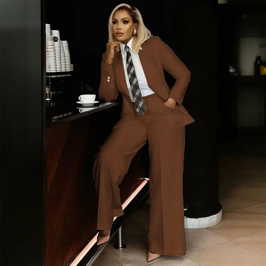 Detail of the slim-fit design of the women's suit pants.