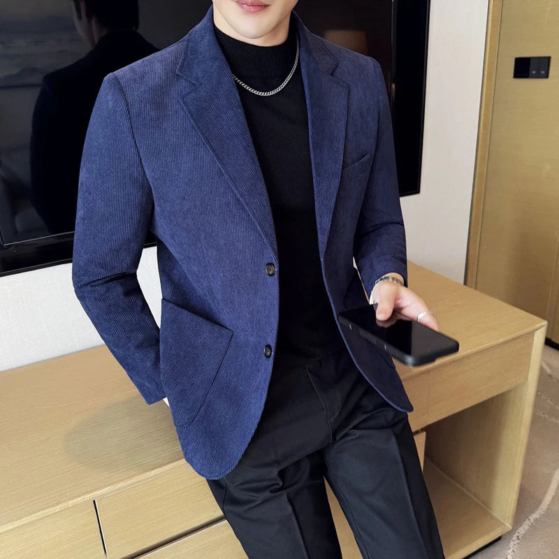 Detail shot of the blazer's lapel, featuring the soft-touch corduroy material.