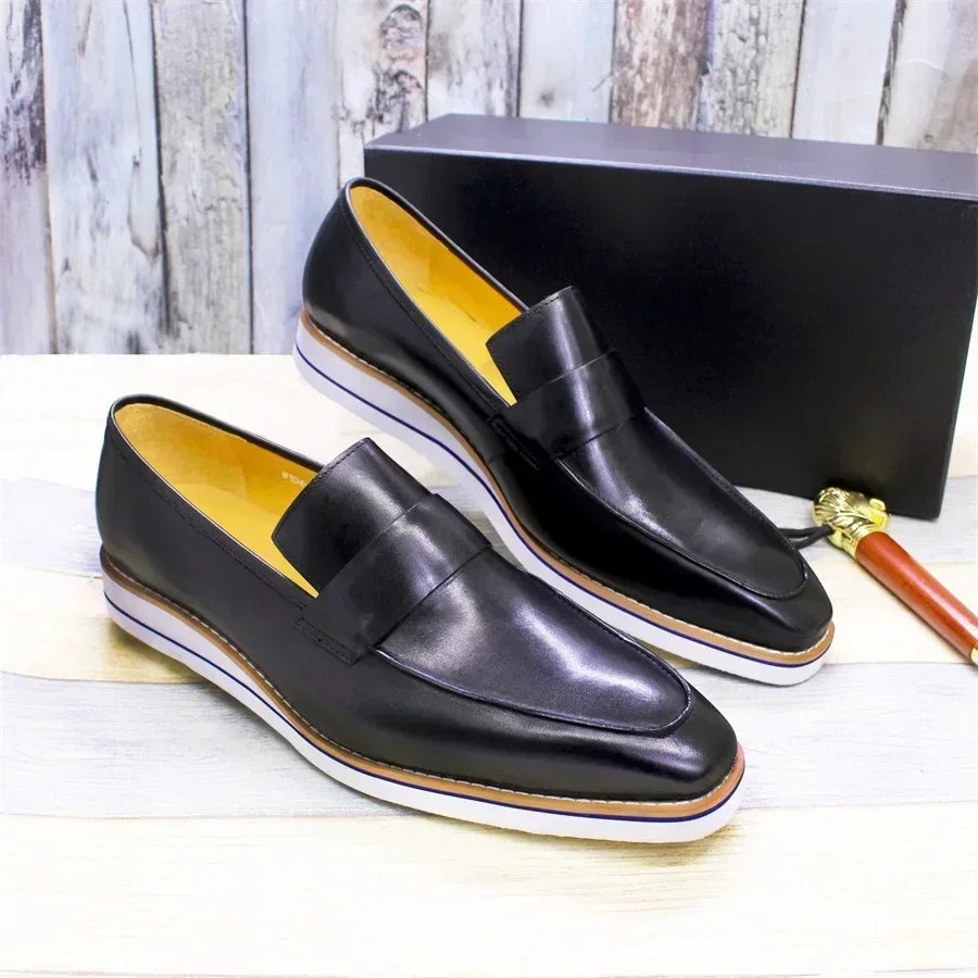 Professional men's leather loafers with durable rubber sole and breathable leather lining for boardroom wear