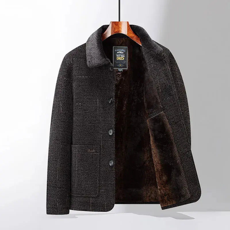 Winter's Whisper coat displayed on a hanger, emphasizing luxury outerwear.