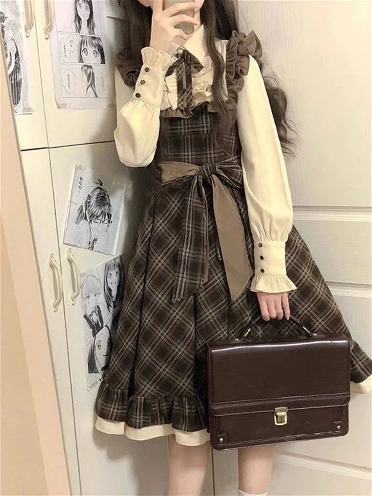 Autumn Whisper midi dress displayed on a hanger, emphasizing its classic plaid pattern and long sleeves.