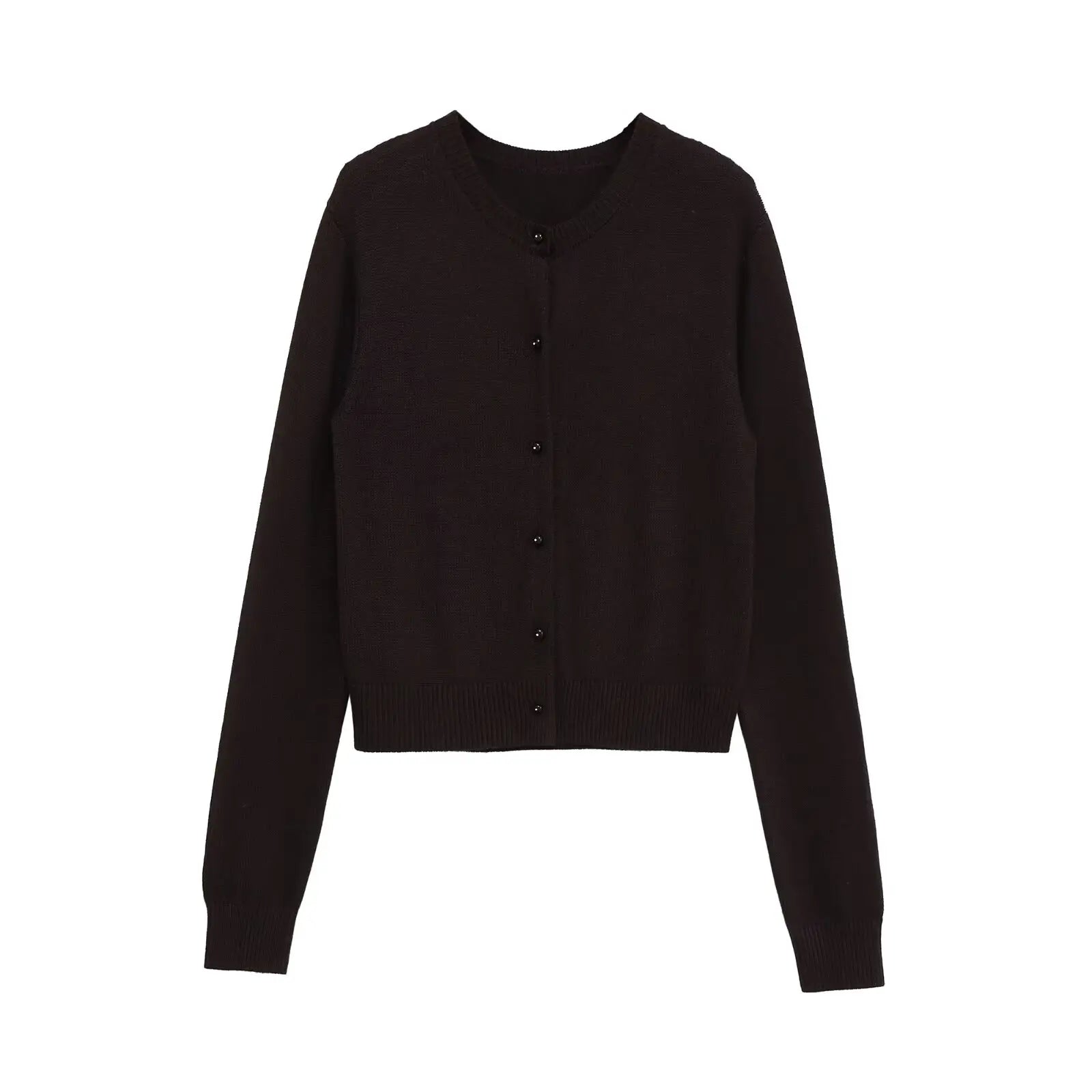 Flat lay of the Autumn Whispers cardigan with autumn leaves, emphasizing its seasonal appeal and warmth.