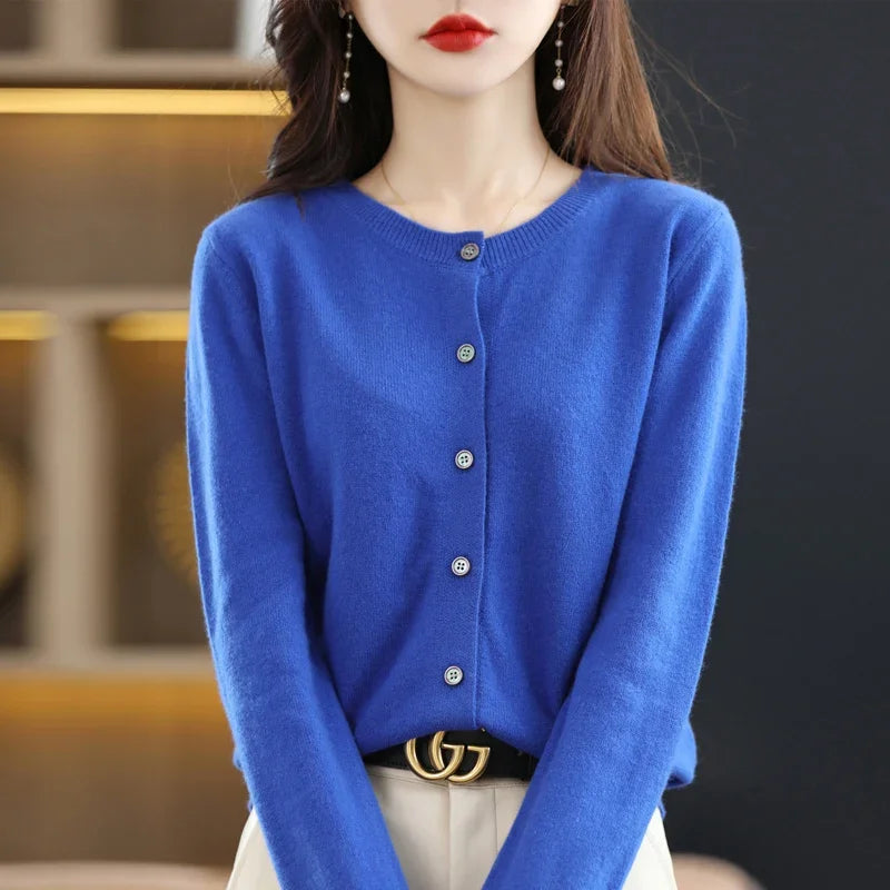 Autumn Whisper Cardigan in a cozy setting, perfect for fall fashion.