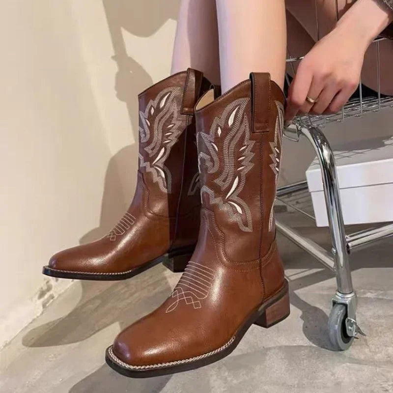 Embroidered square toe leather cowboy boots in brown with intricate Western stitching details