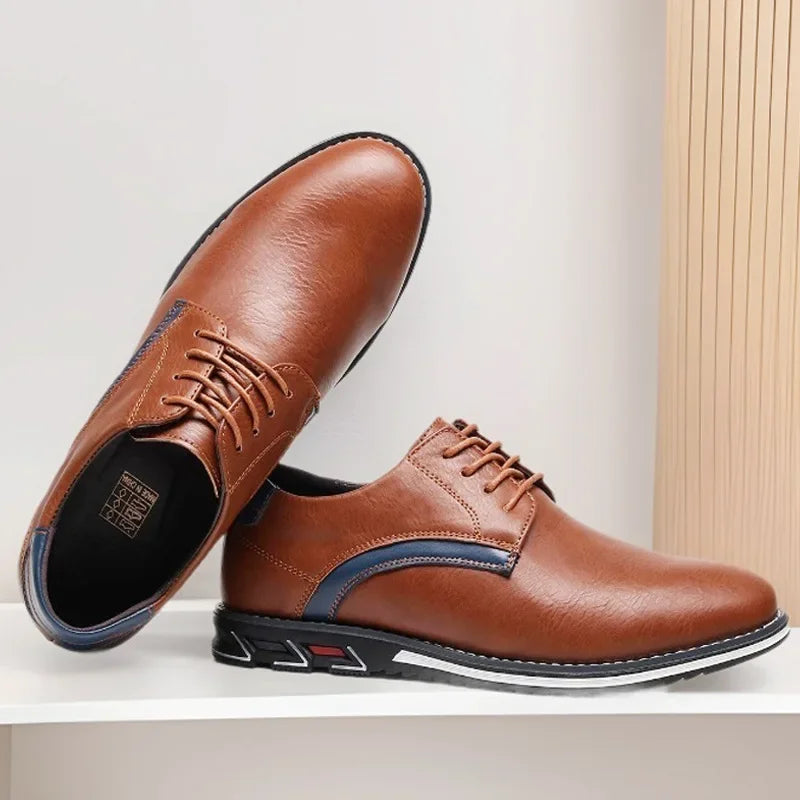 Classic men's leather oxford shoes featuring breathable construction and odor-resistant insole technology