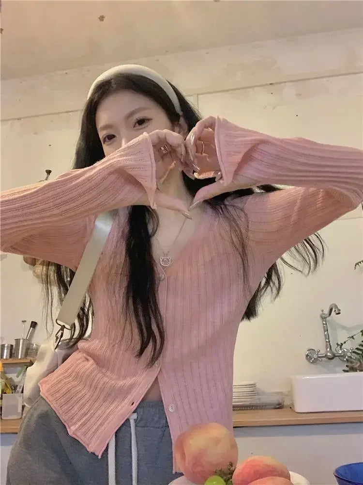 Close-up of the cozy knit fabric of the Autumn Whisper sweater, showcasing its premium quality.