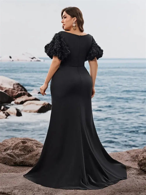 Close-up of the satin texture of the Midnight Cascade dress, highlighting its comfort and elegance.
