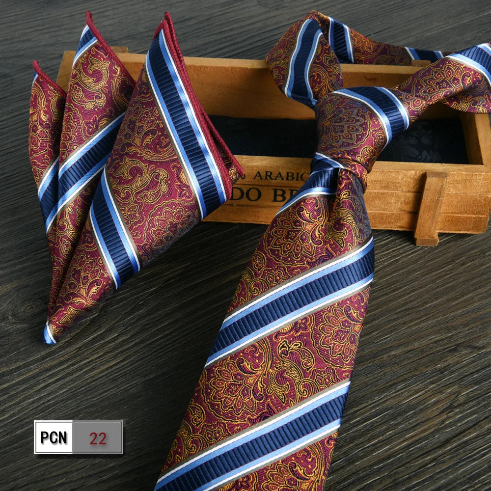 Versatile wine-red tie and scarf set for confident dressing.