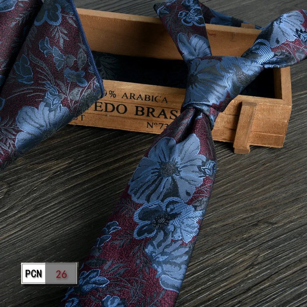 Elegant wine-red tie set for confident, stylish men.