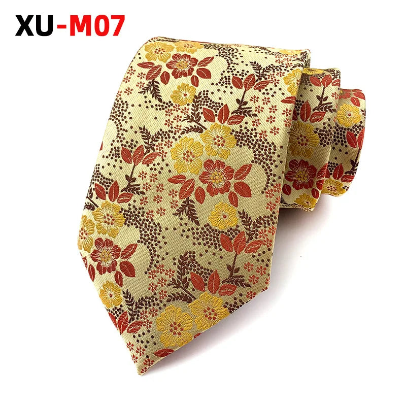 Red jacquard tie folded neatly, emphasizing its durable craftsmanship.