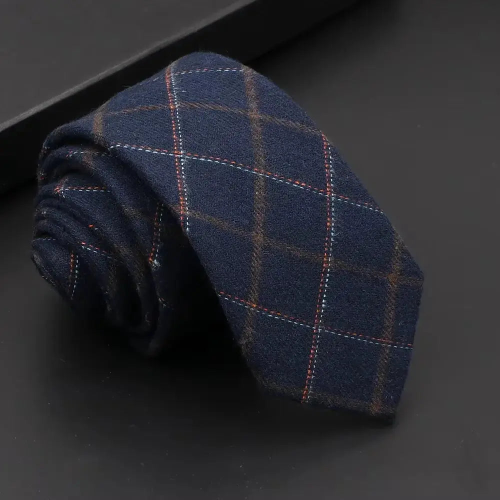 Handcrafted black necktie, a statement accessory for any wardrobe.