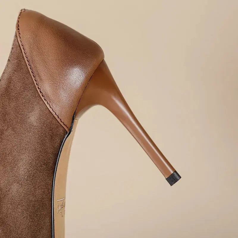 Close-up of premium leather slingback heel showing pointed toe silhouette and sophisticated craftsmanship