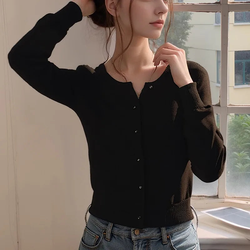 Autumn Whispers cardigan in rich brown, showcasing plush knit texture and flattering drape.