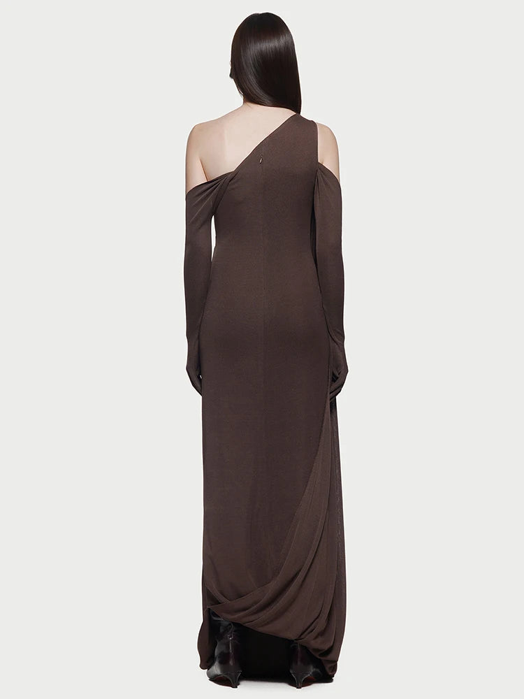 Model showcasing the elegant silhouette of the evening dress at a gala.