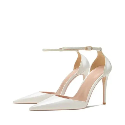 Black high fashion heels with a striking pointed toe design.