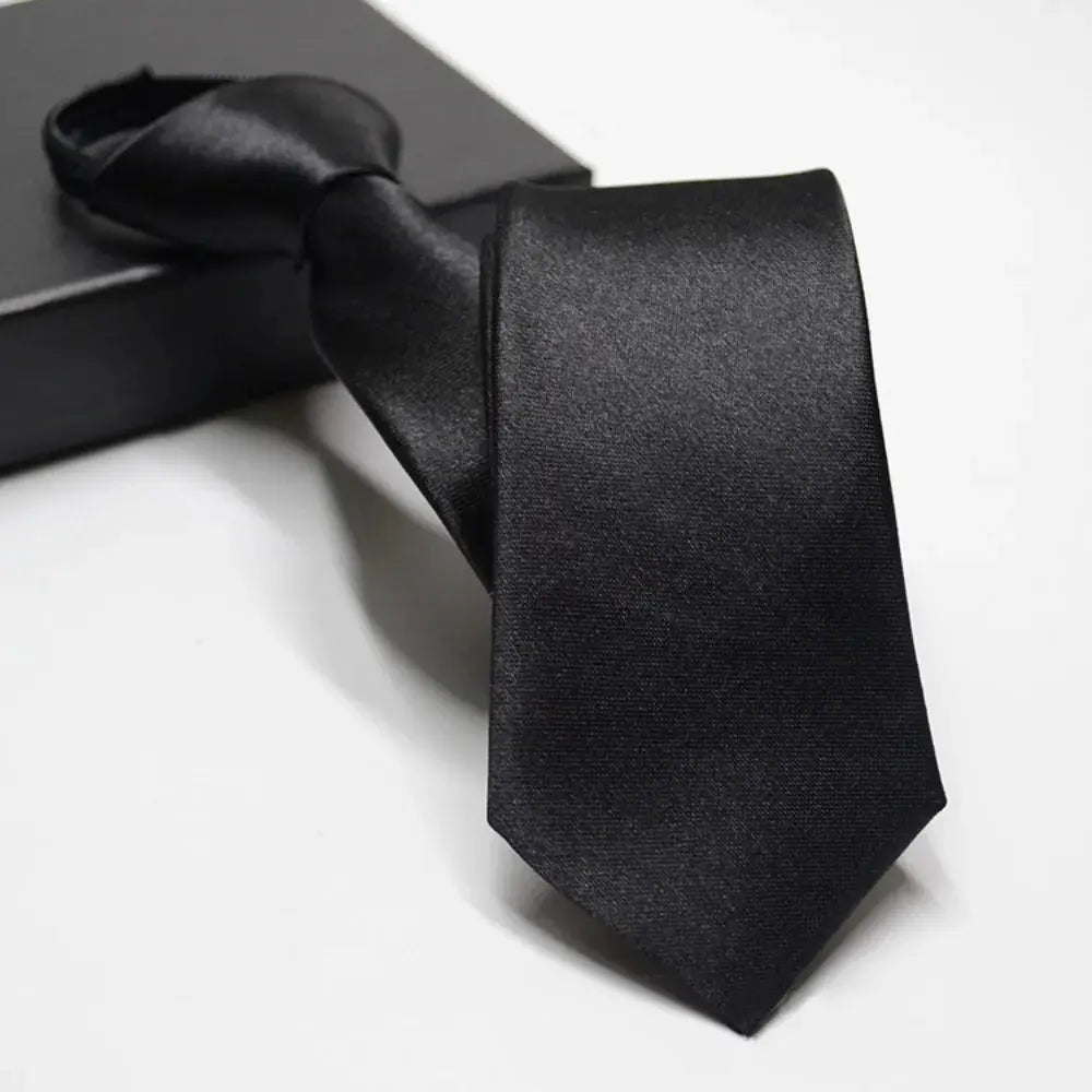 Sophisticated black tie with a sleek design, perfect for business meetings and weddings.