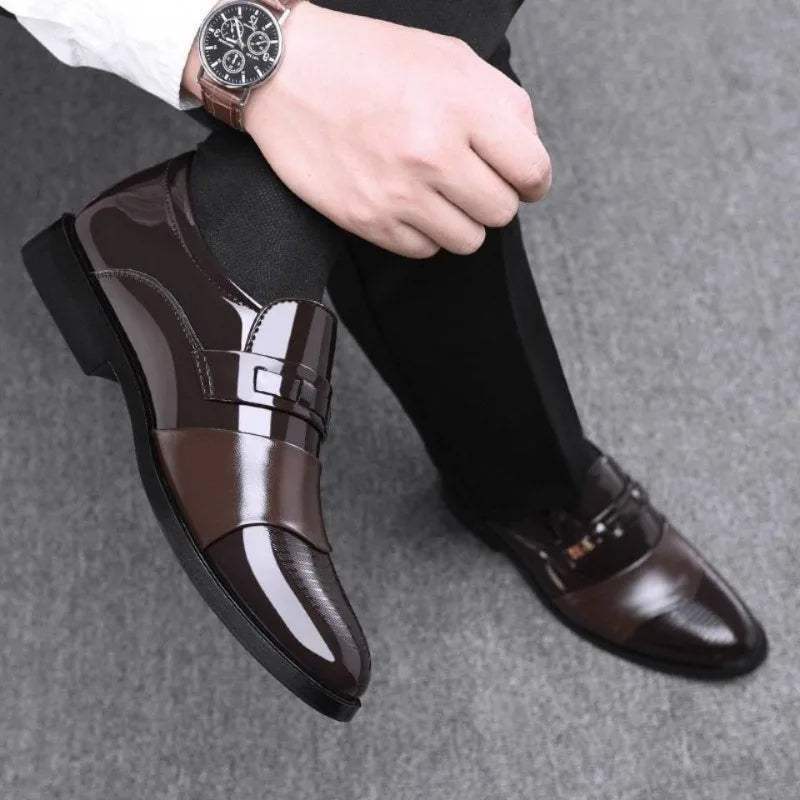 Sleek black waterproof leather shoes with pointed design for confident style.