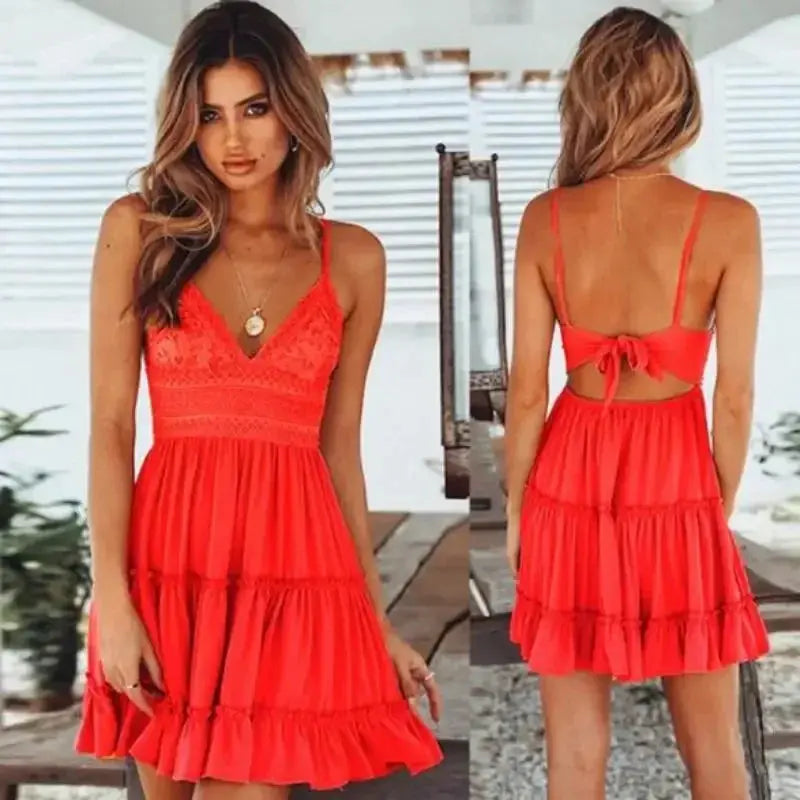Model wearing the Captivate the Coast sundress, highlighting the V-neckline and spaghetti straps.