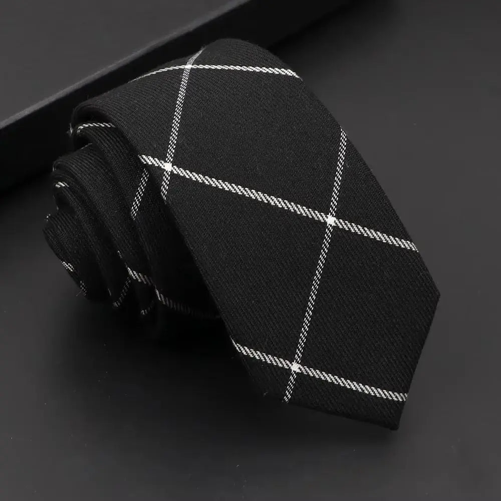Lightweight black necktie, designed for comfort and elegance.