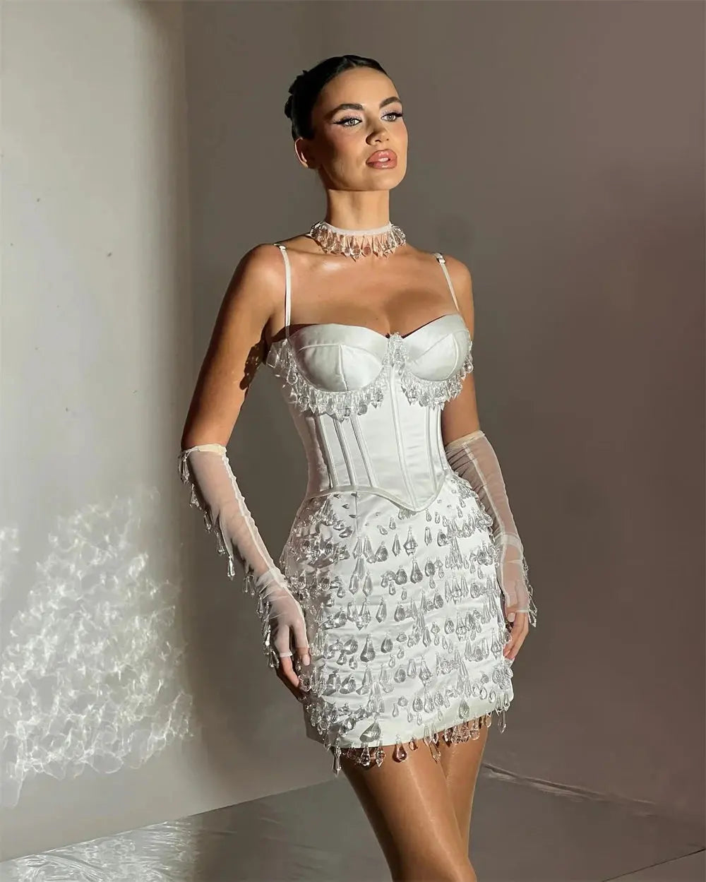Model wearing the Enchant the Night dress, showcasing its flattering contouring fit.