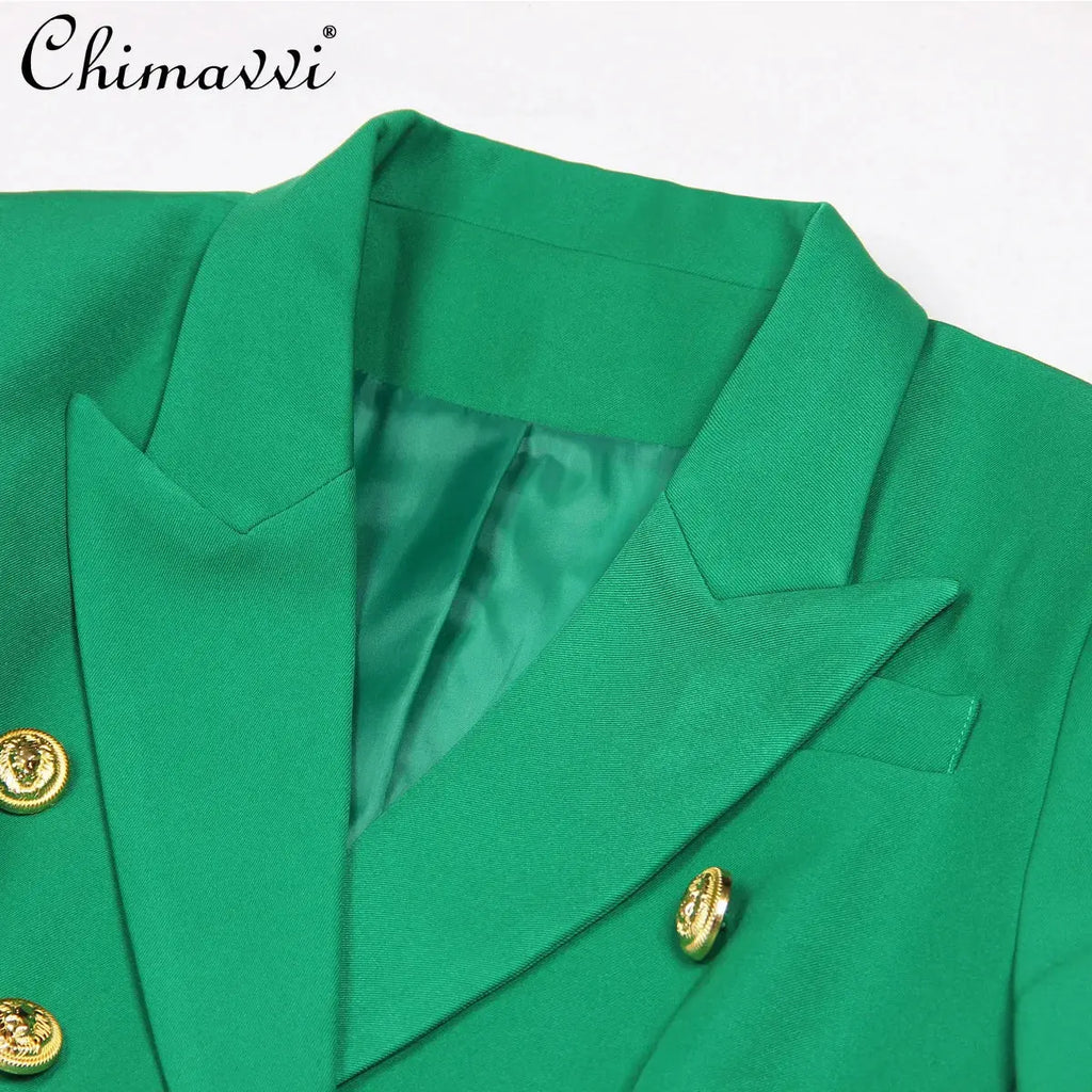 Back view of the double-breasted jacket highlighting its structured design.