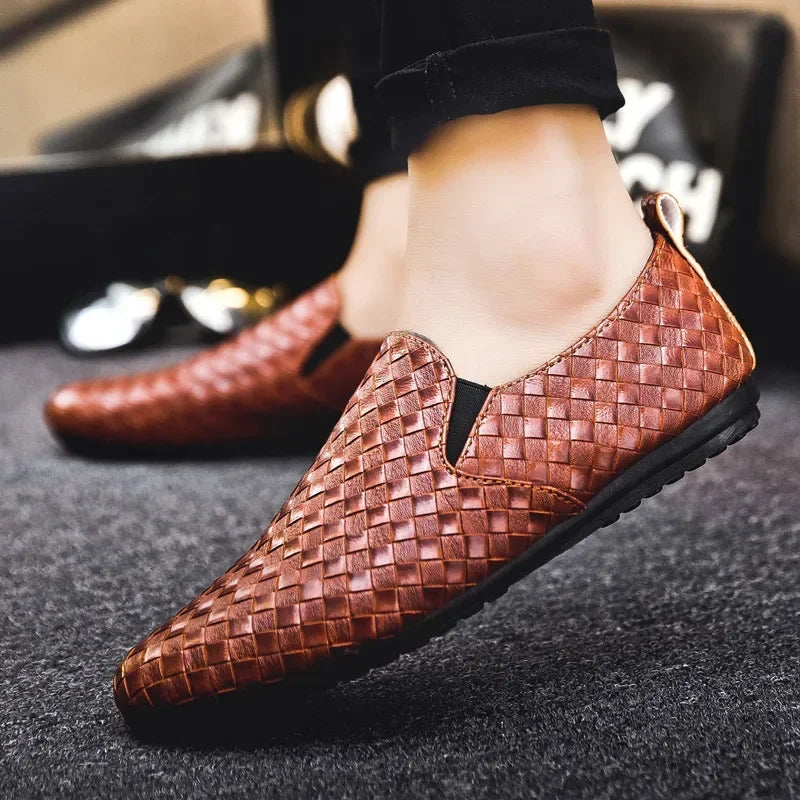 Whisper-Soft Loafers on a wooden surface, emphasizing their chic and sophisticated look.