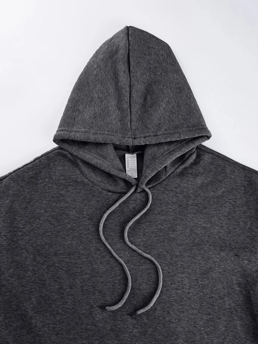 Close-up of the adjustable drawstring on the Urban Comfort hoodie for a custom fit.
