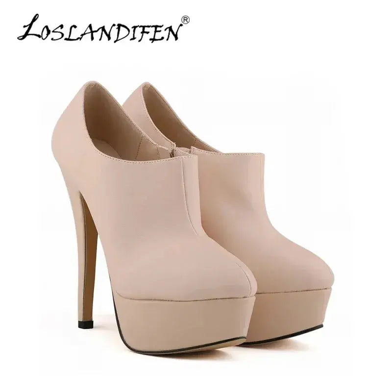Side view of sky-high stiletto pumps showcasing sleek design.