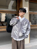 Layered look featuring Urban Poet cardigan, perfect for autumn and winter styling.