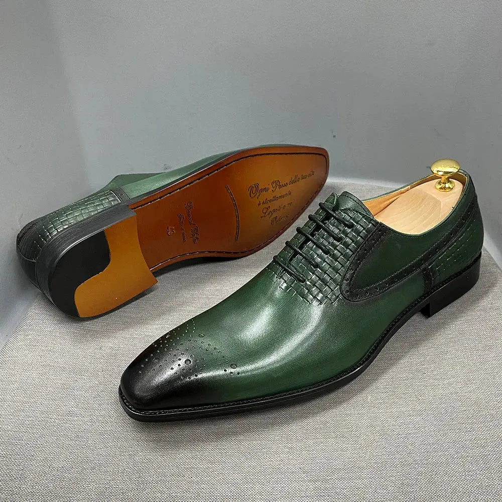 Side view of luxurious green leather brogue Oxfords for men.