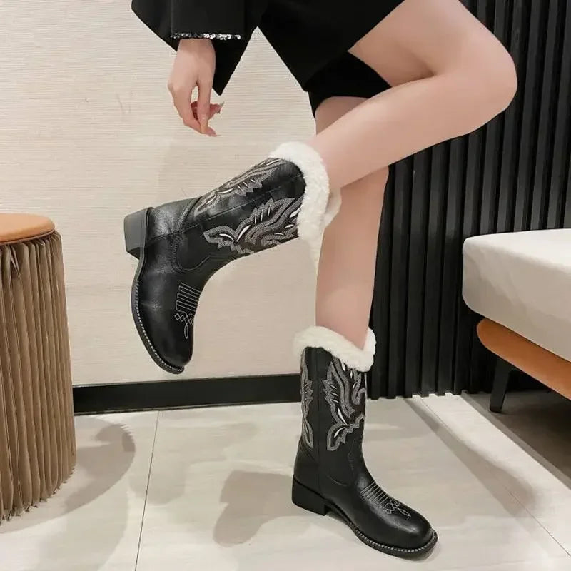 Women's leather cowboy boots with hand-inspired embroidery and pull-on convenience