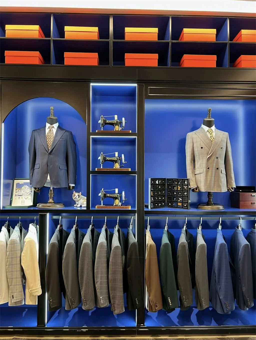 Back view of plaid slim-fit suit jacket displaying structured fit and classic British tailoring