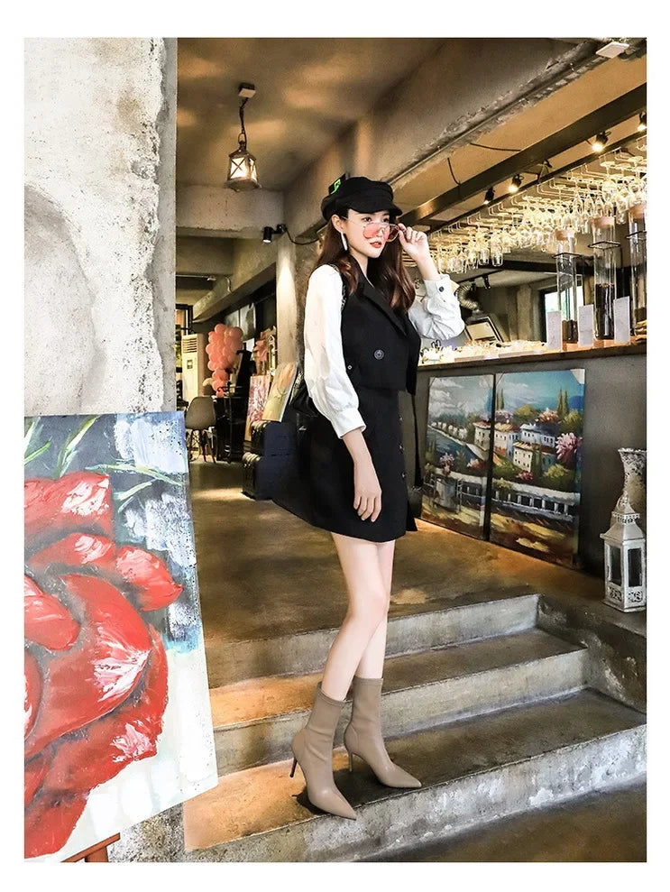 Sleek leather mid-calf boots ideal for office and evening wear