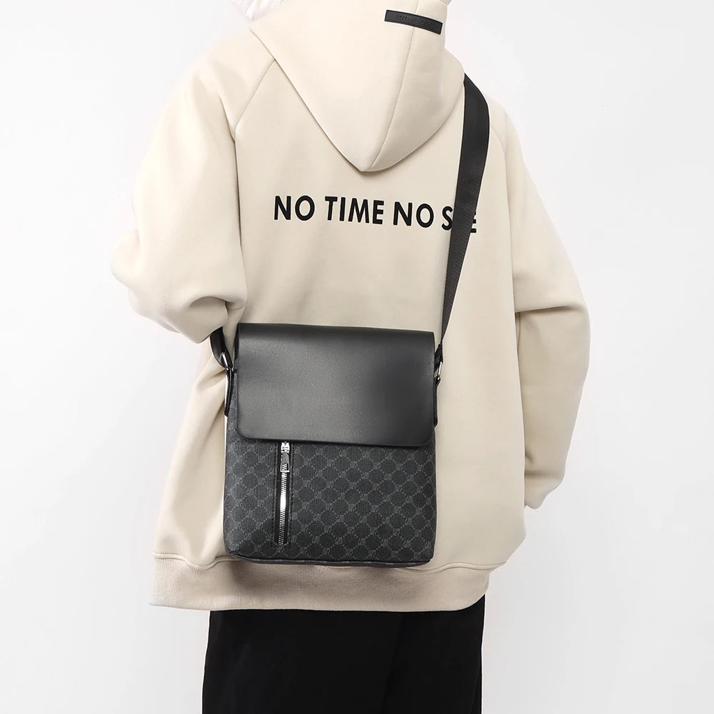 Premium black saddle-shaped crossbody bag with durable nylon lining and adjustable shoulder strap