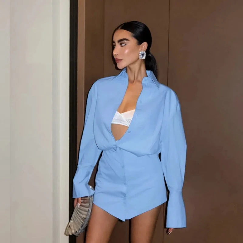 Lightweight polyester blouse with a turn-down collar in soft pastel color.