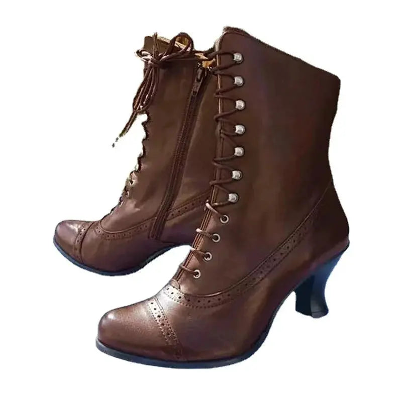 Mid calf combat style boots with platform sole and spike heel shown from side angle