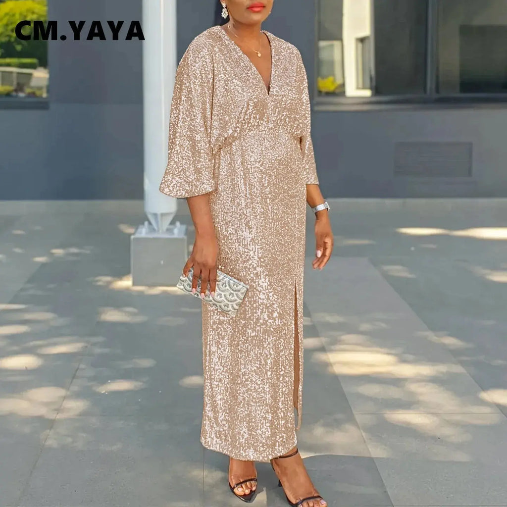 Model wearing the Captivate the Night gown, highlighting the elegant side split and flattering fit.