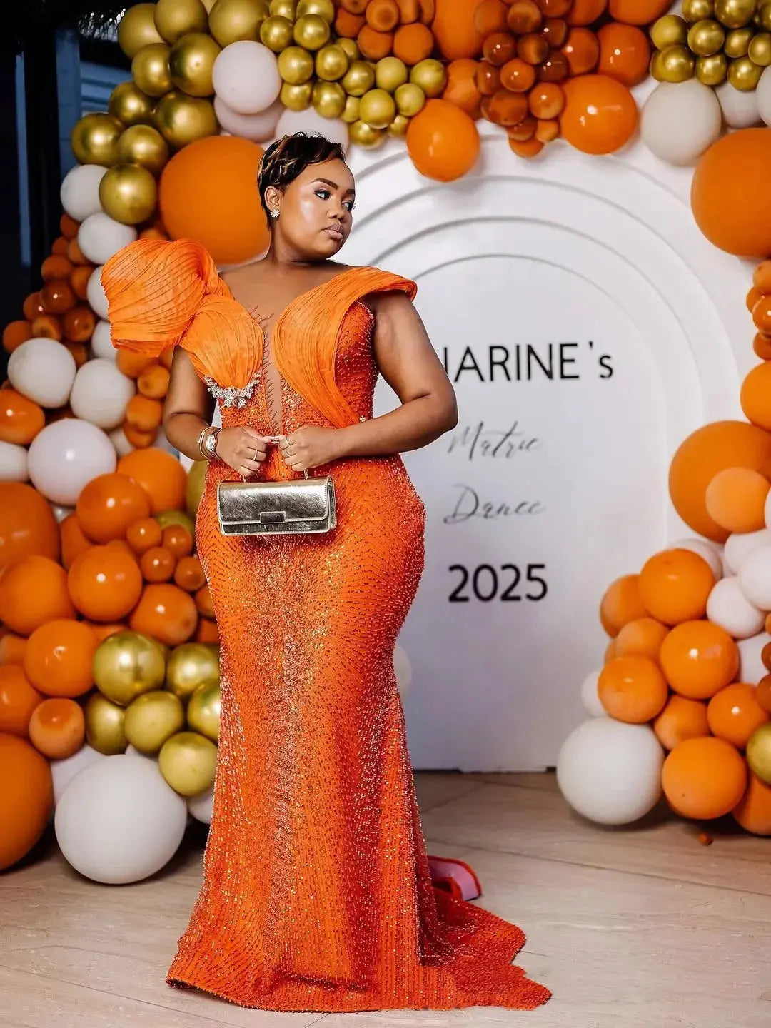 Full view of the Sunlit Glow Mermaid Gown, highlighting its floor-length design and luxurious fabric.
