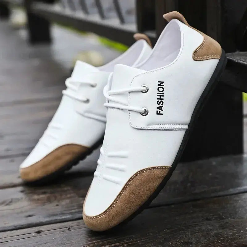 Lace-up white sneakers featuring durable rubber soles for support.