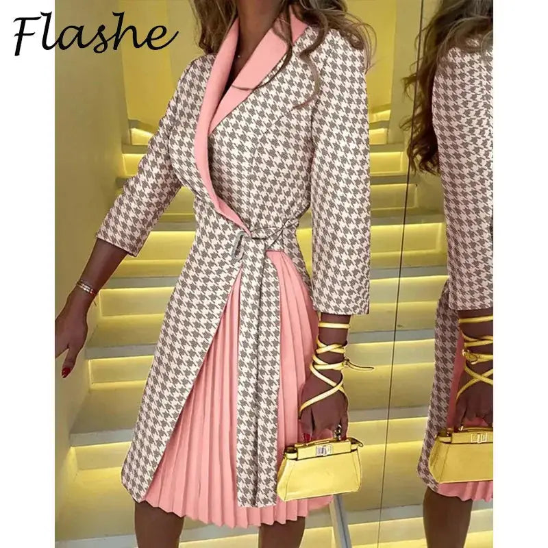 Model wearing the Whimsical Autumn Midi dress, highlighting its mid-calf length and soft chemical-fiber fabric.