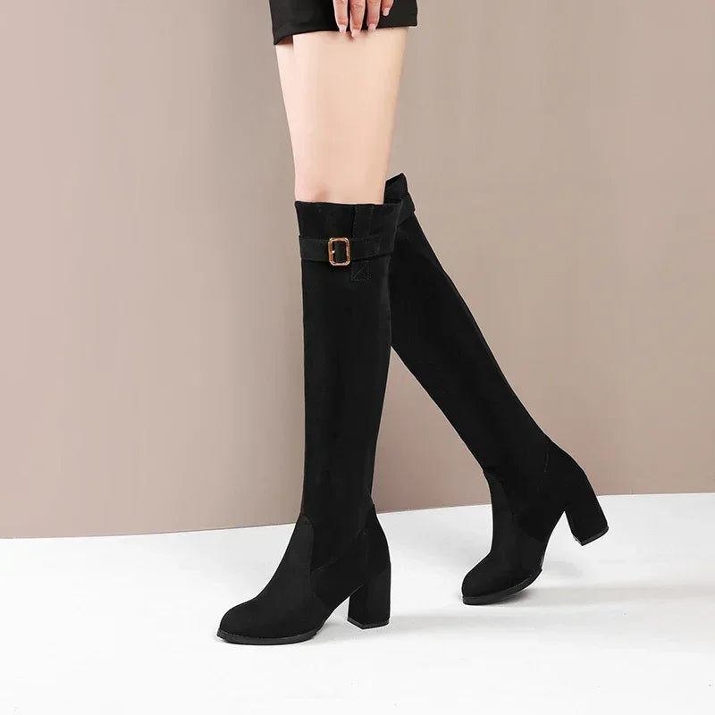Mid-calf boots in premium waterproof suede with slip-on design and square heel