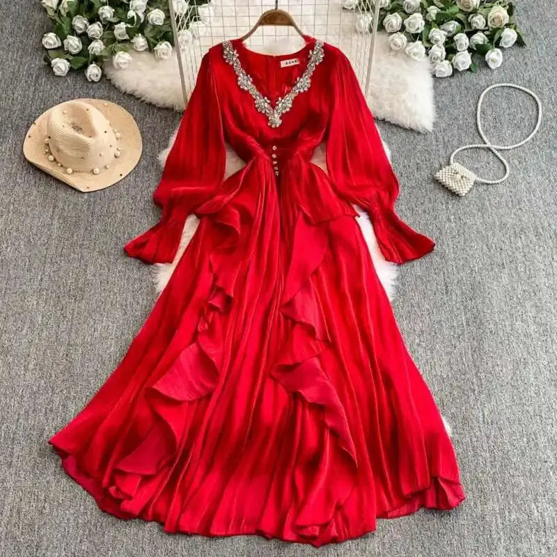 Model wearing the elegant rhinestone midi dress at a garden party, exuding confidence.