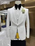 White jacquard three-piece suit featuring a sleek jacket and tailored trousers.