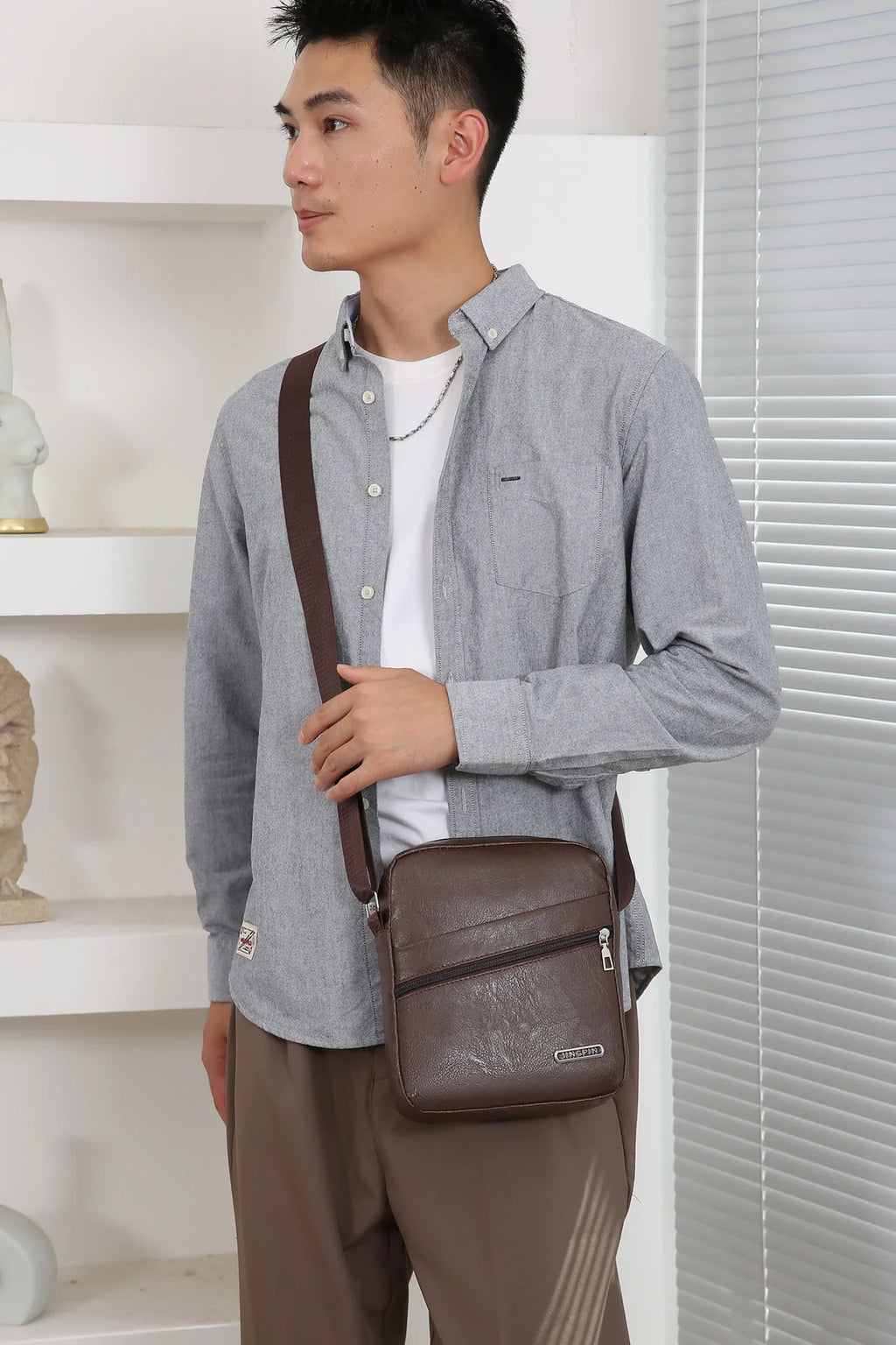Durable polyester messenger bag designed for modern explorers refusing to compromise on style