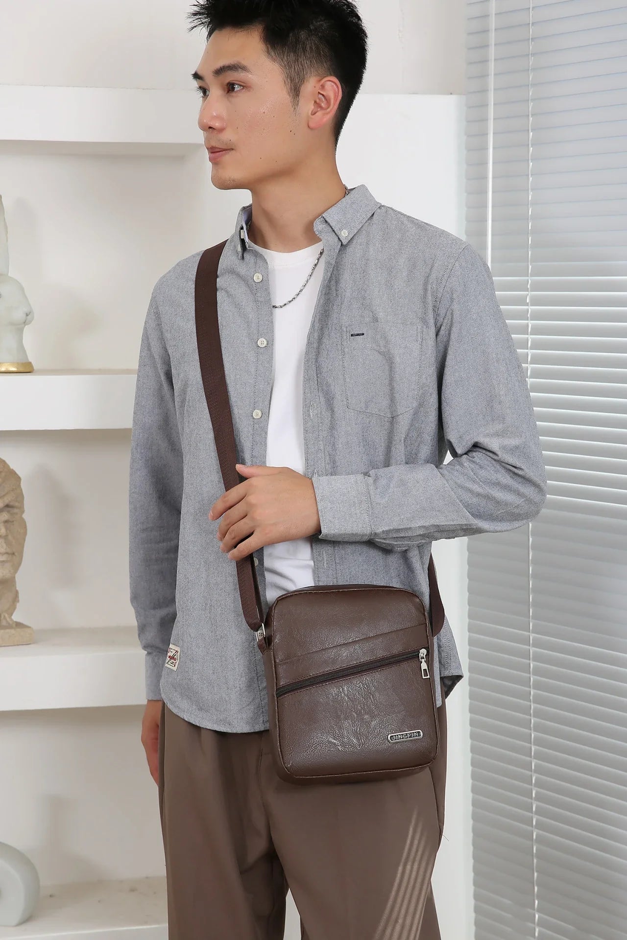 Durable polyester messenger bag designed for modern explorers refusing to compromise on style