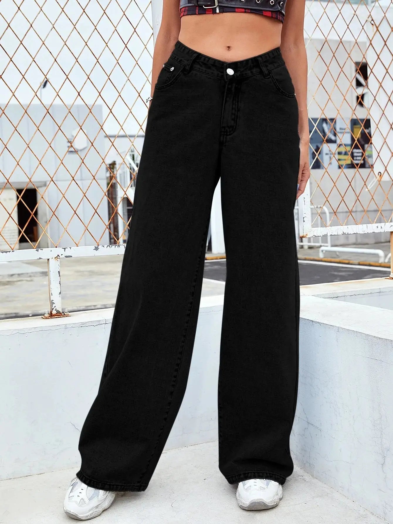 Versatile neutral-tone jeans styled with a casual top for effortless day-to-night wear.