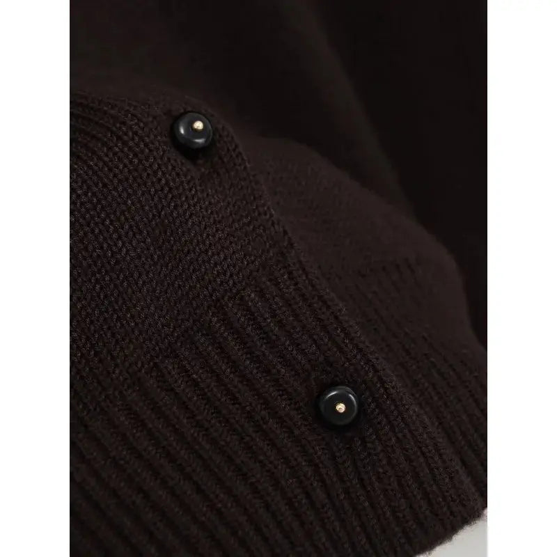 Autumn Whispers cardigan styled with jeans, demonstrating its versatility for casual and formal wear.