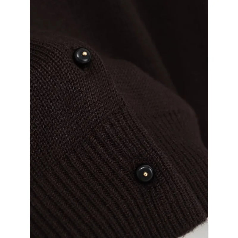 Autumn Whispers cardigan styled with jeans, demonstrating its versatility for casual and formal wear.